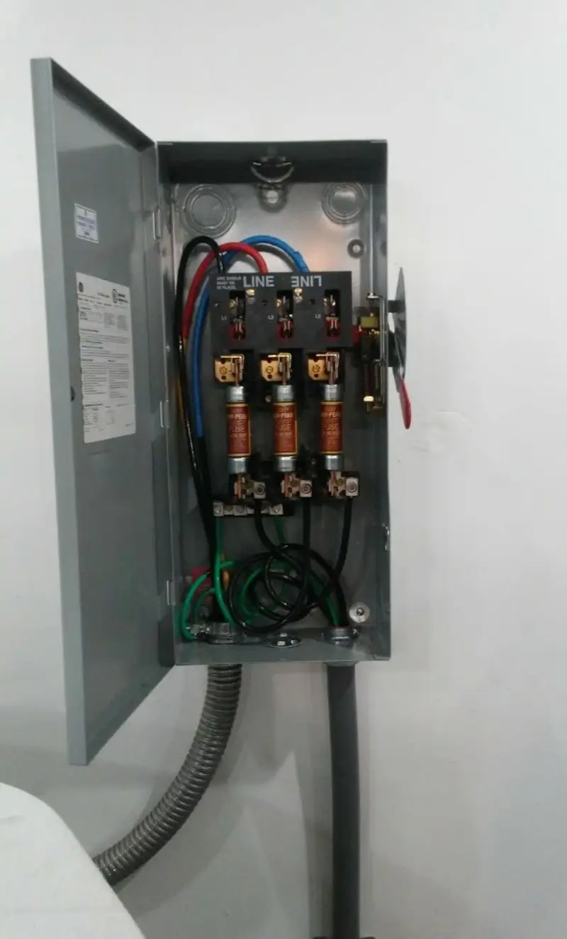 Three-phase disconnect switch installed for Electrical Wiring & Rewiring in London Britain